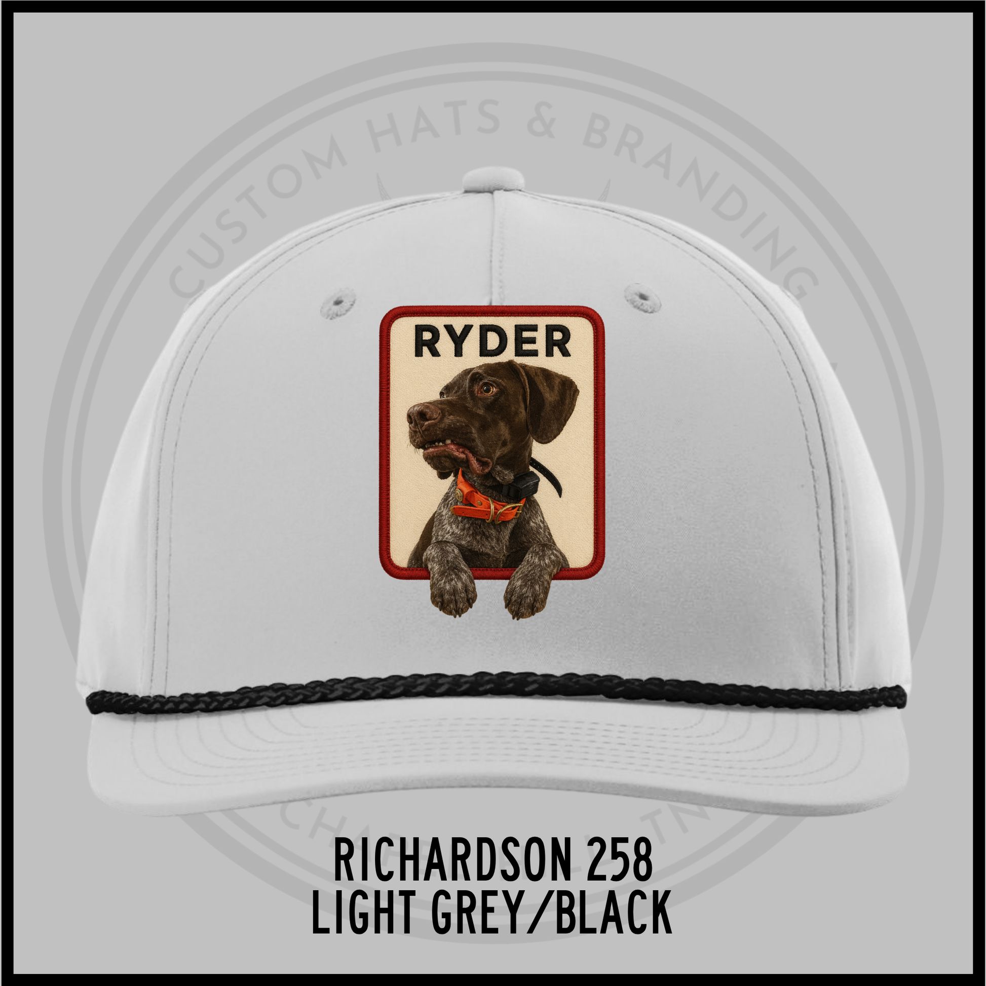Customized dog personality baseball cap, light grey with black trim, patch 'RYDER'.
