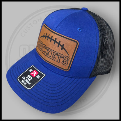 Royal blue cap with brown Rockets football front patch, curved brim, 112 badge
