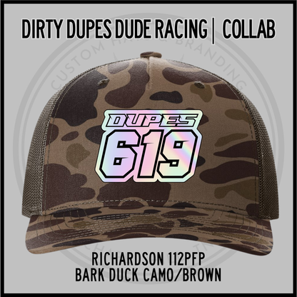 Bark duck camo Richardson 112PFP trucker cap with '619' front patch
