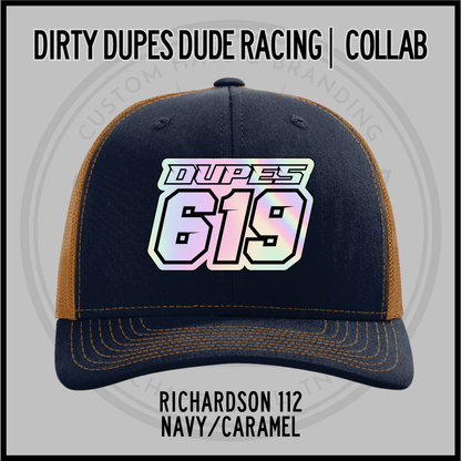 Navy/caramel Richardson 112 racing cap with DUPES 619 front patch