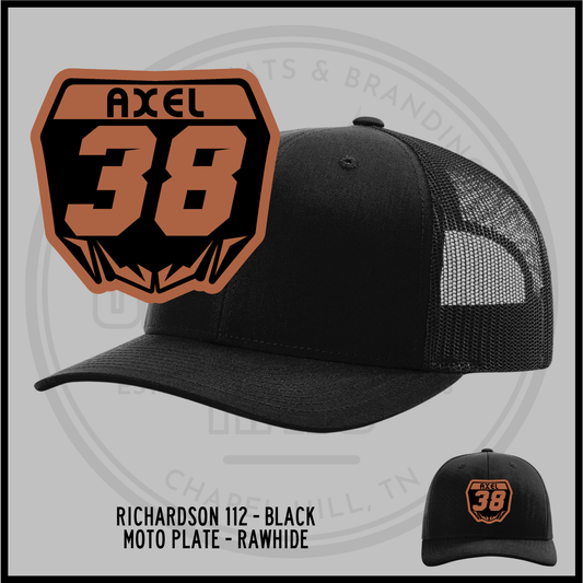 Black trucker baseball cap with mesh back and embroidered 38 badge front