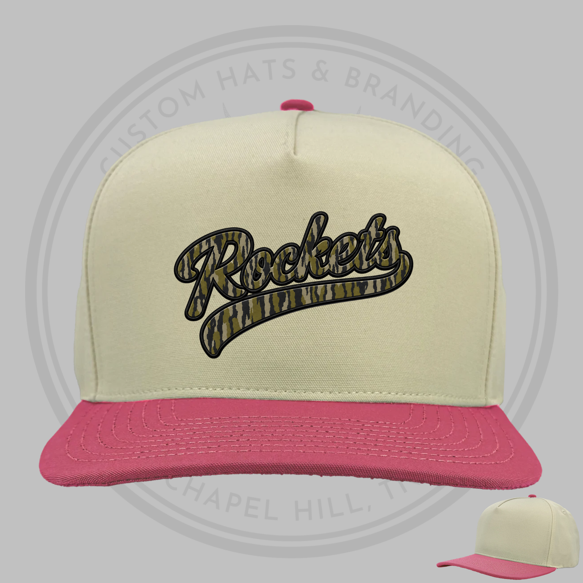Cream baseball cap with pink brim and dark Rockets script logo