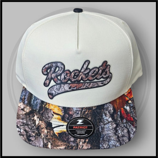 Cream baseball cap with Rockets logo front, Patriot patch and camo brim