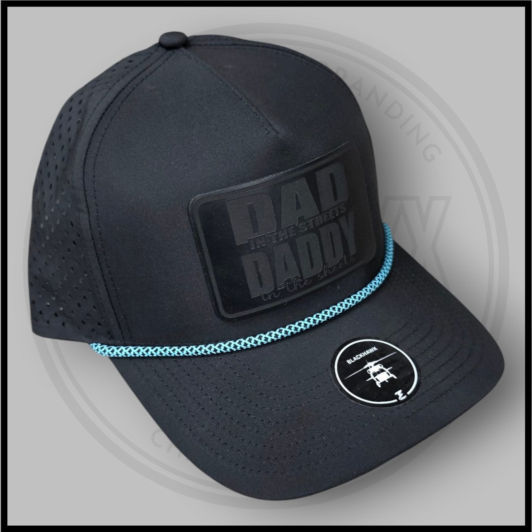 Blackhawk R+ black cap, angled view with blue braided trim and circular front logo