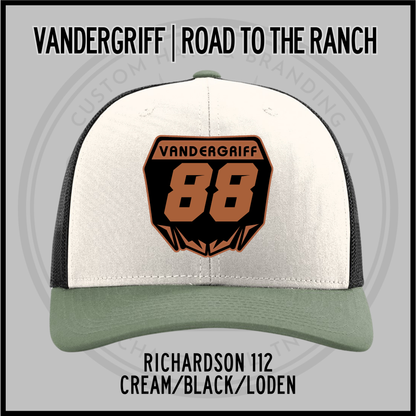 Cream and loden baseball cap with embroidered "Vandergriff 68" patch and dark underbrim