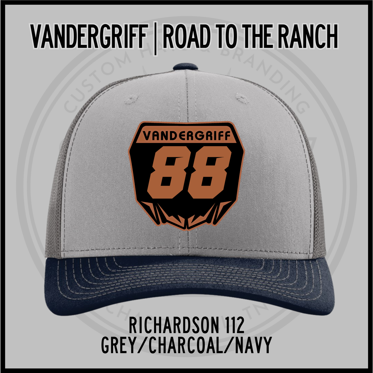 Grey and navy baseball cap with embroidered "Vandergriff 68" patch, charcoal top, navy brim