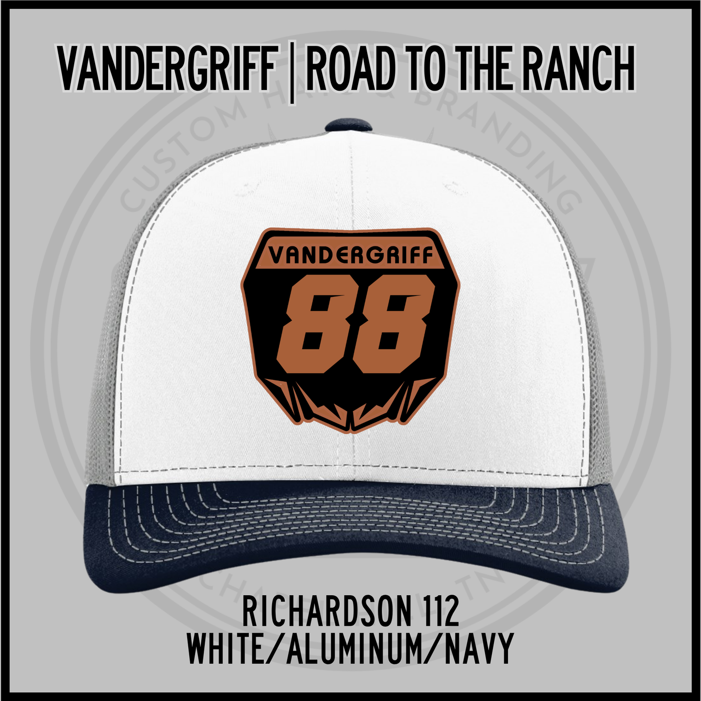 White and navy baseball cap with embroidered "Vandergriff 68" patch and navy underbrim