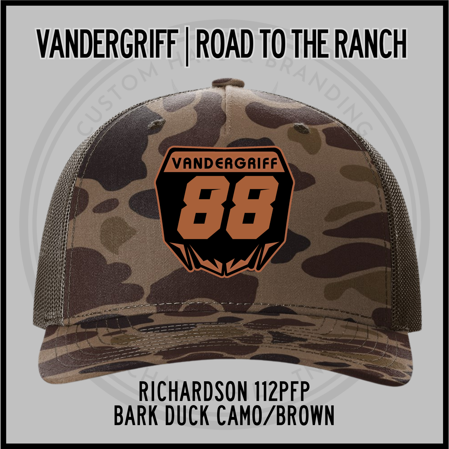 Camo trucker cap with mesh back, orange 88 emblem on front; Bark Duck/Brown