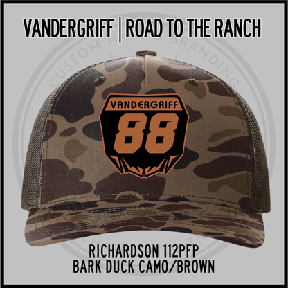 Camo trucker cap with mesh back, orange 88 emblem on front; Bark Duck/Brown