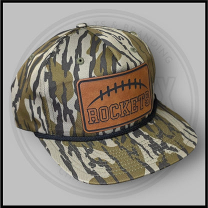 Camo football cap with orange Rockets patch and stitched football design
