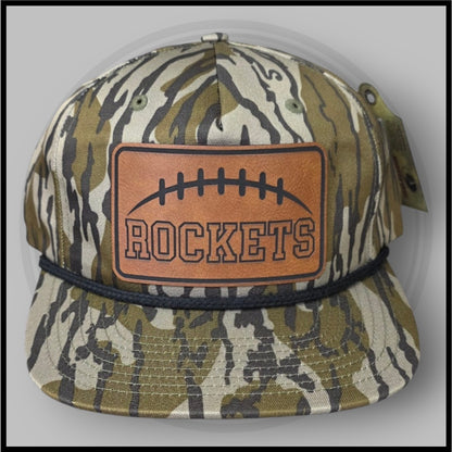 Camo football cap front view with orange Rockets logo patch and stitched football